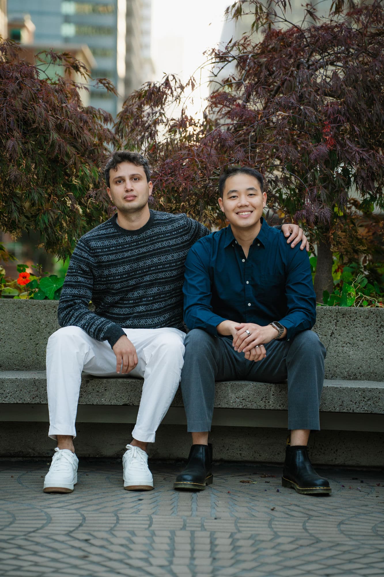 a1mobile co-founders Kasim Inan and Darryl Foong seated together